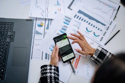 A woman working on her smartphone.